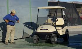 washing golf cart